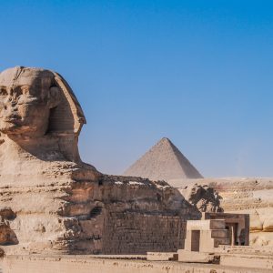 The Great Sphinx with the Pyramids of Giza behind it