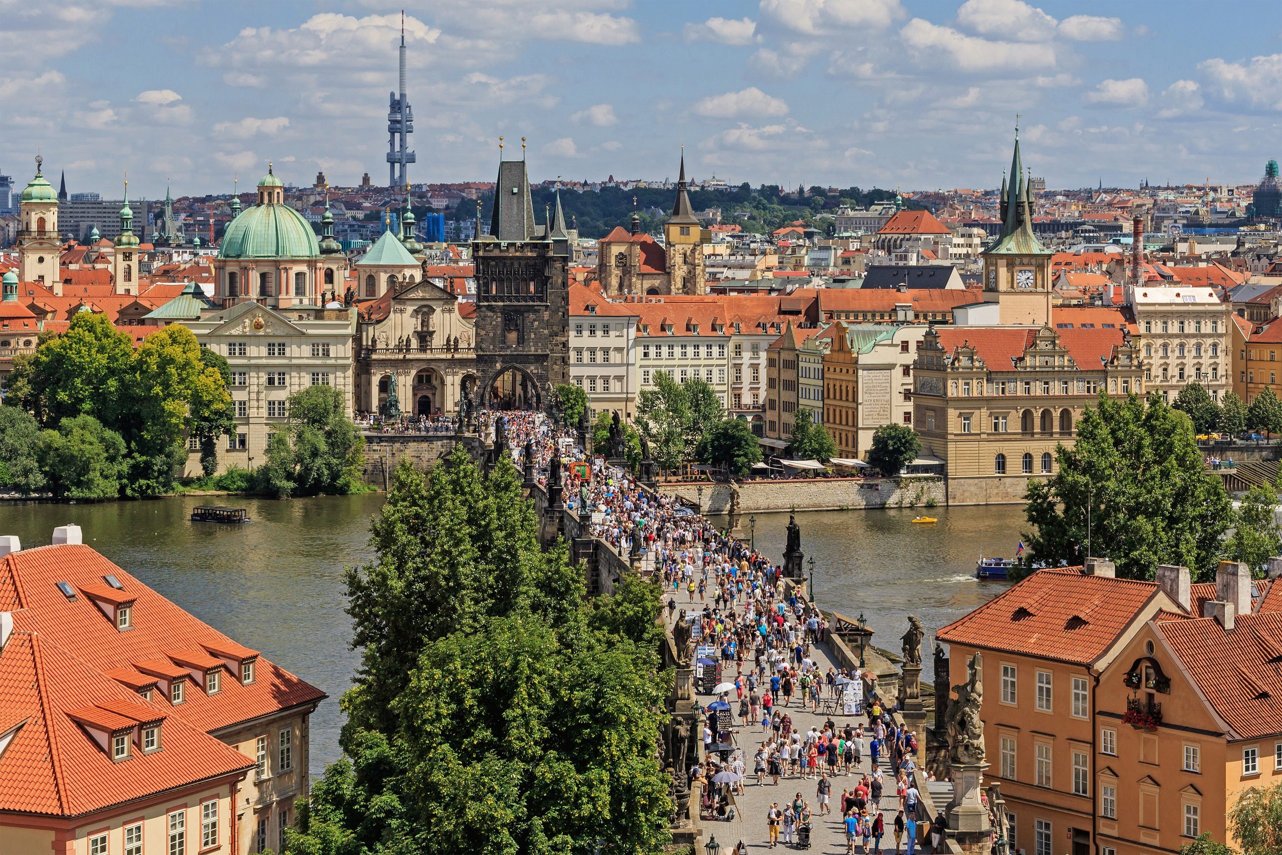 The statues of Charles Bridge over the Vltava river in Prague