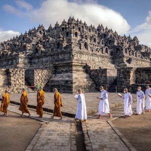 Stone stupas of Borobudur temple at sunrise in Central Java, Indonesia