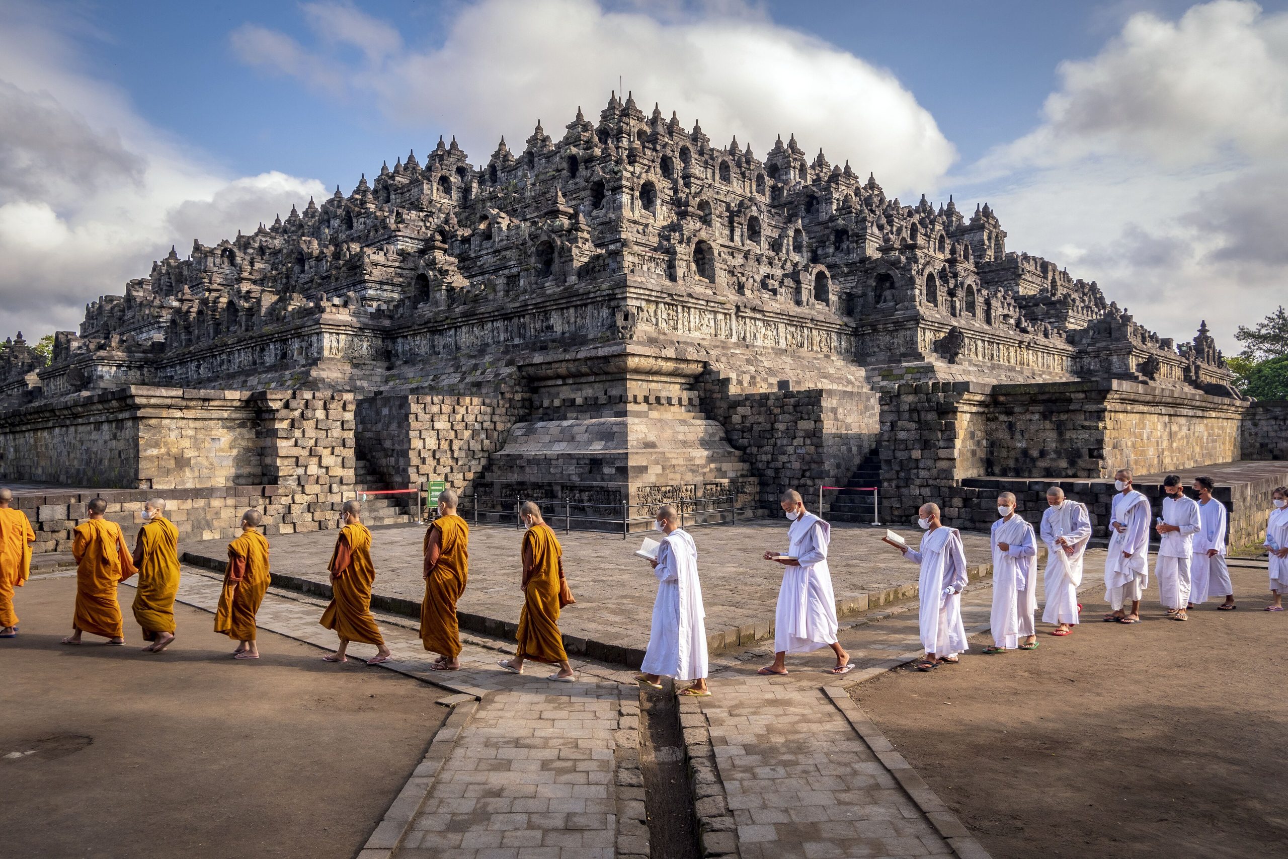 Stone stupas of Borobudur temple at sunrise in Central Java, Indonesia